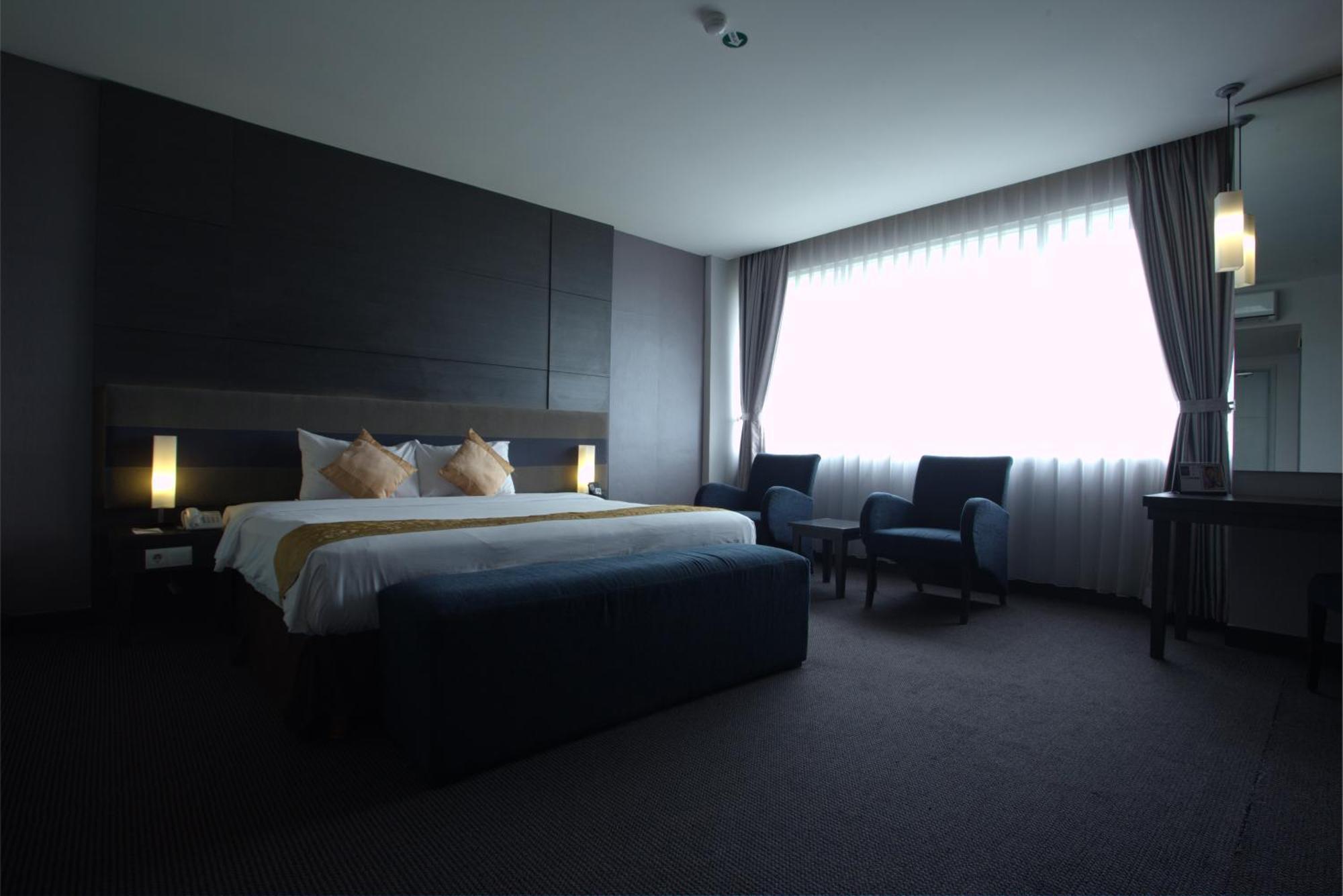 Tjokro Hotel Пеканбару Стая снимка