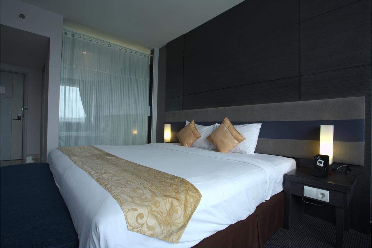 Tjokro Hotel Пеканбару Стая снимка