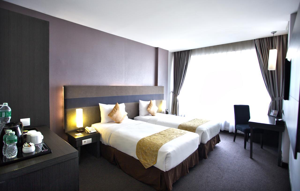 Tjokro Hotel Пеканбару Стая снимка