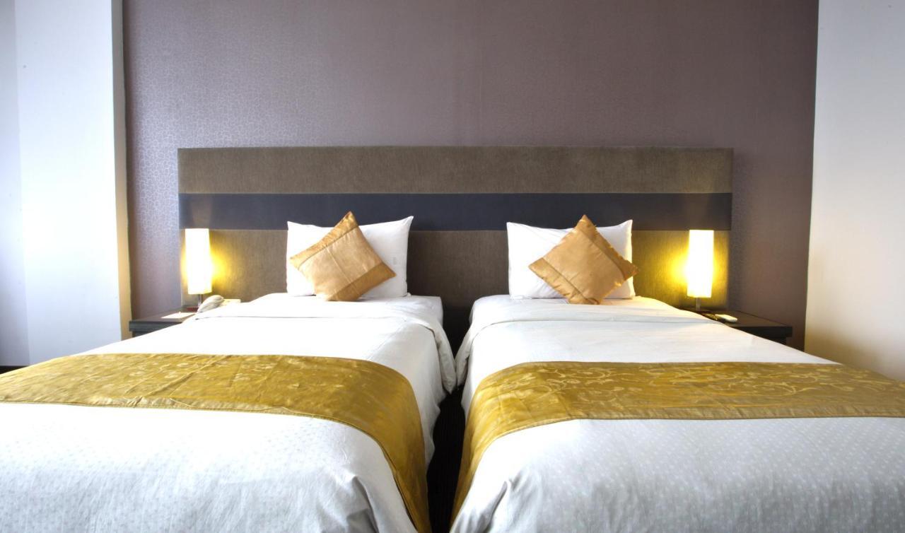 Tjokro Hotel Пеканбару Стая снимка